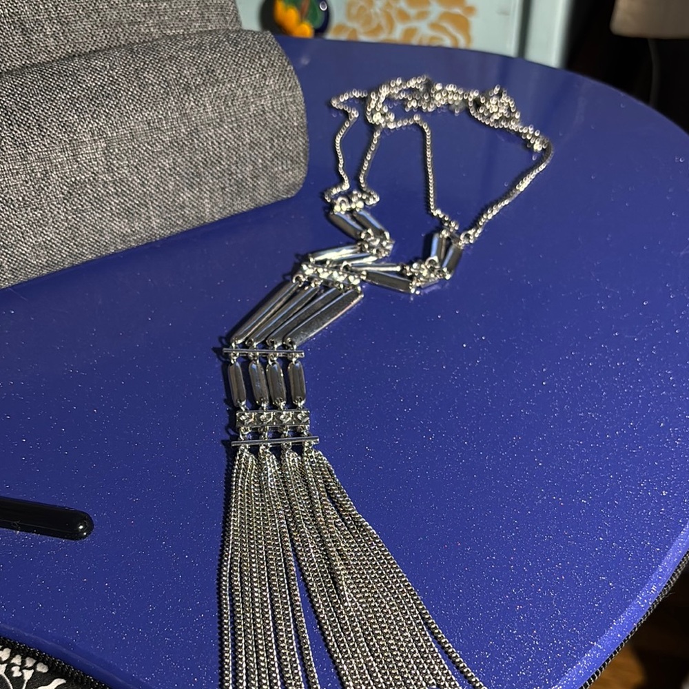 Elegant Silver Necklace with Tassel Design